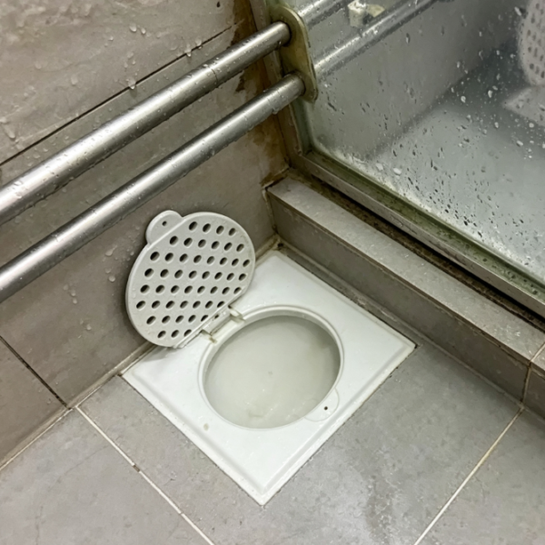 Shower Area Floor Drain Unclogging Service
